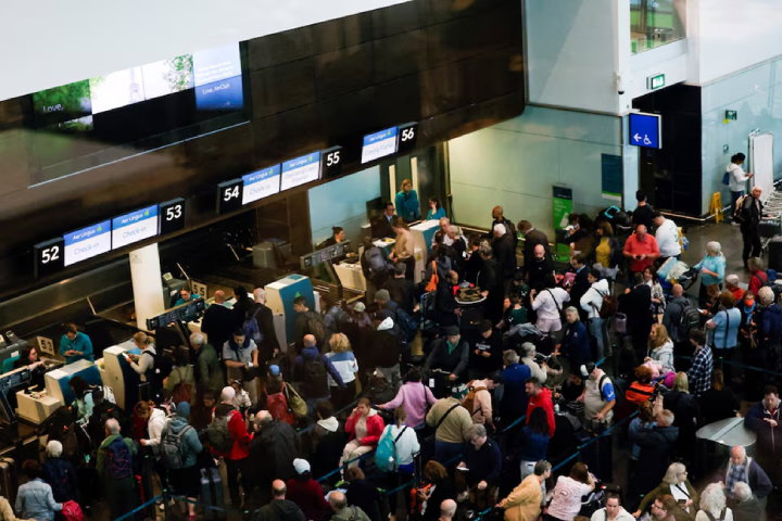 TechDogs-"An Image Showing People In Queue Inside Dublin Airport"